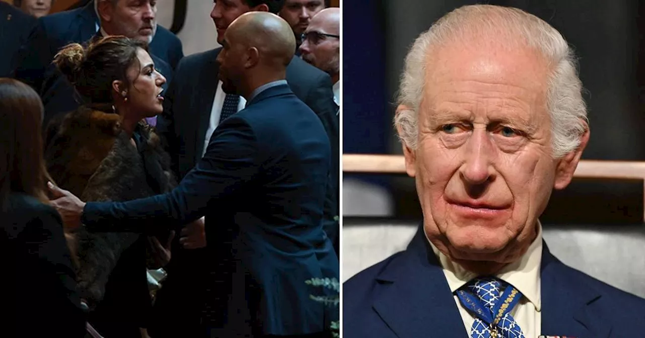 Charles and Camilla confronted by angry protester accusing royals of 'genocide'