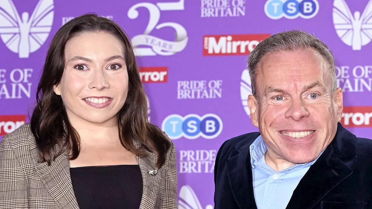 Warwick Davis smiles alongside his daughter Annabelle at Pride Of Britain Awards in first red carpet...