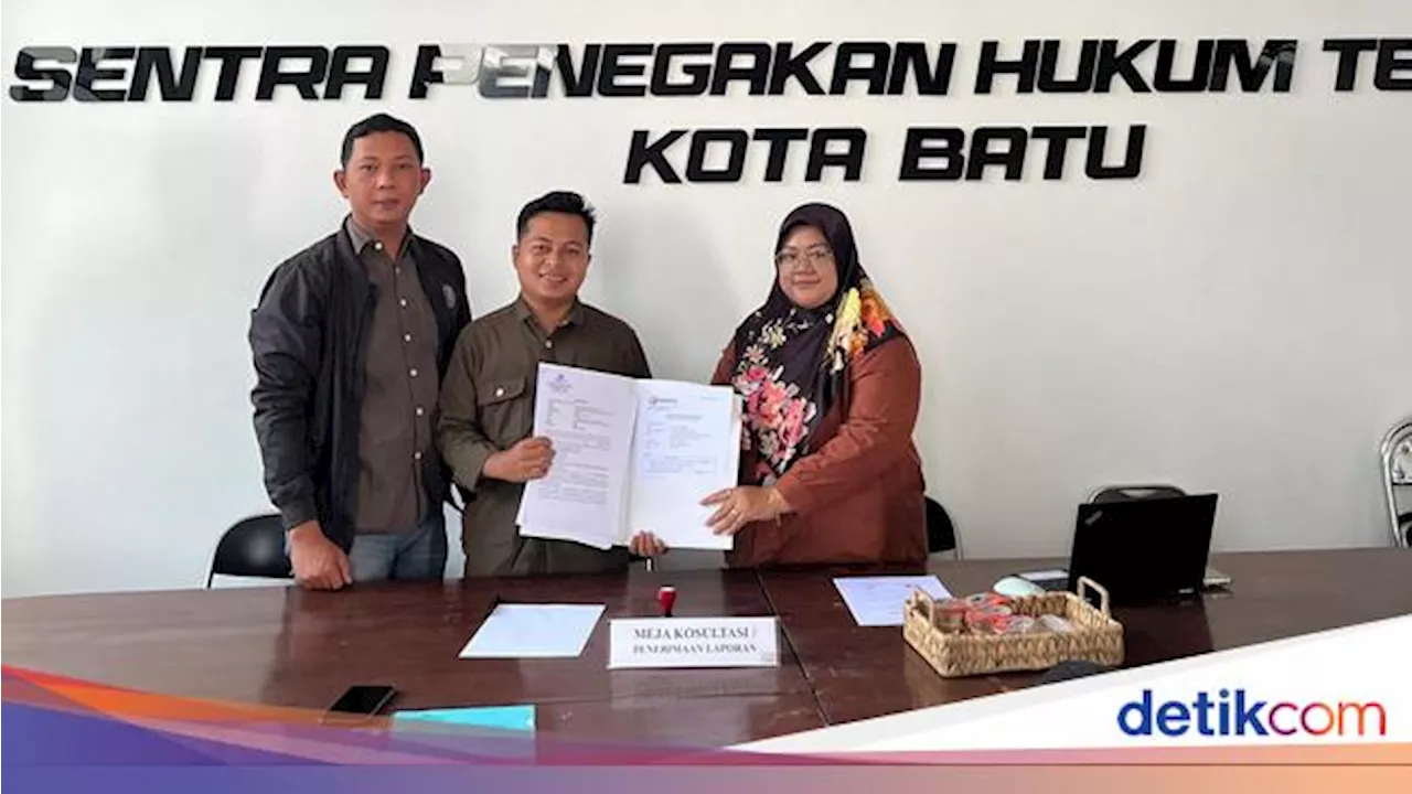 Tim Nurochman-Heli Suyanto Lapor Bawaslu Kota Batu Dugaan Pengrusakan APK