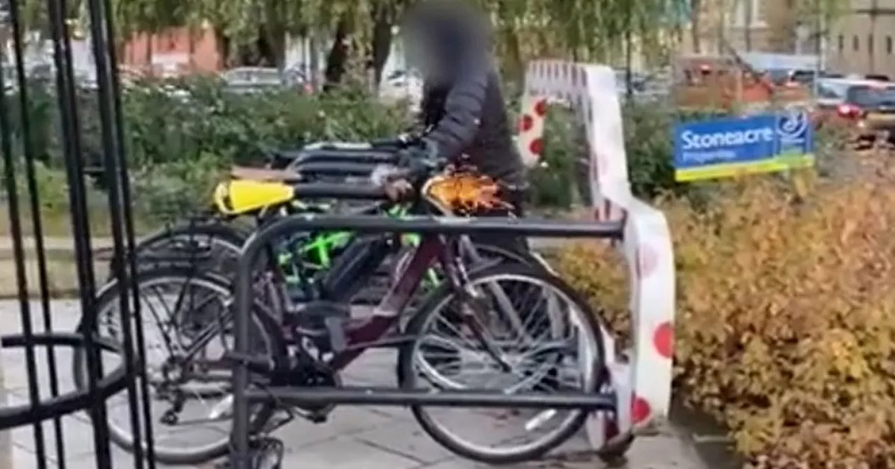 Moment e-bike is stolen from Leeds street by man with angle grinder