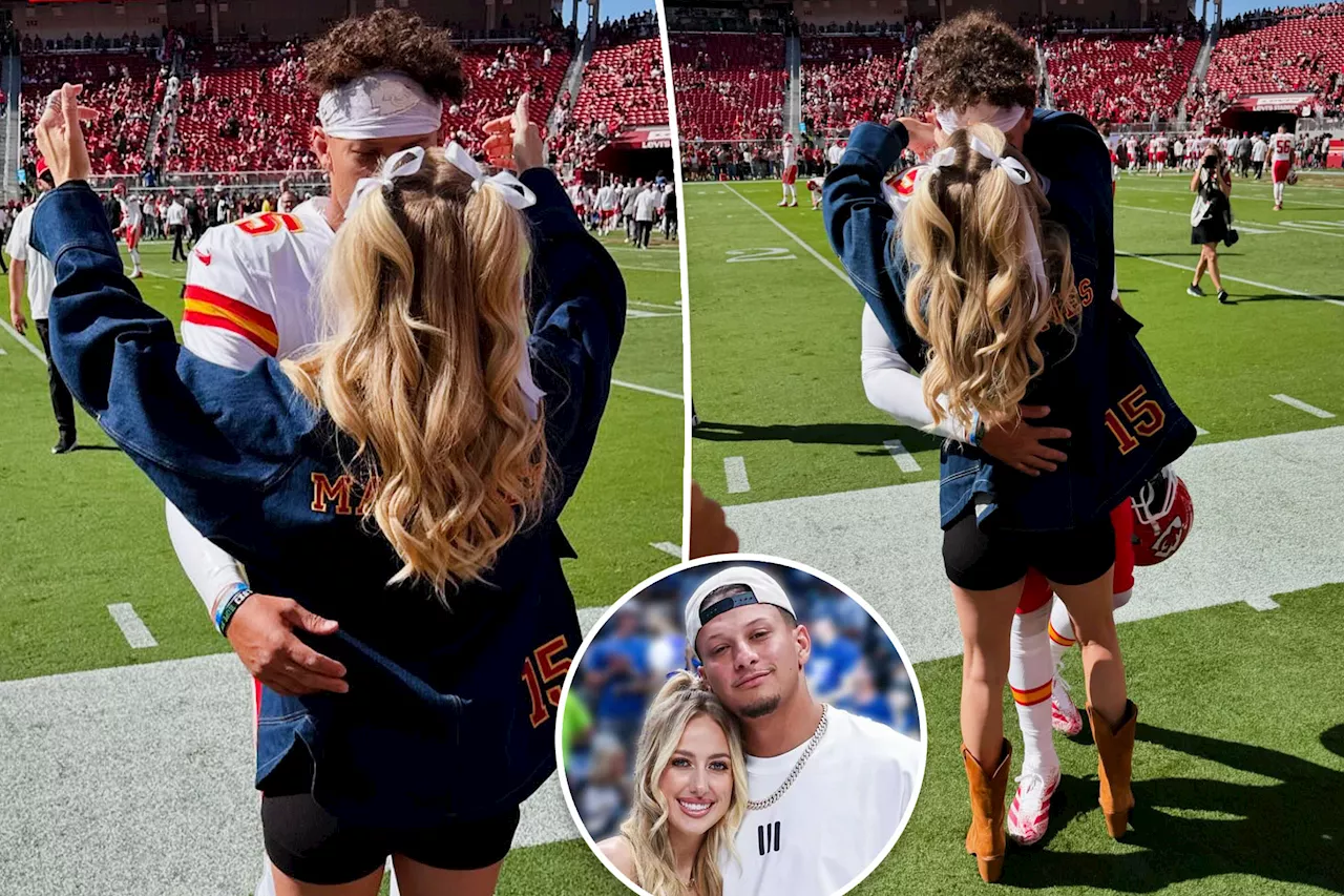 Pregnant Brittany Mahomes kisses Patrick while celebrating Chiefs win over 49ers