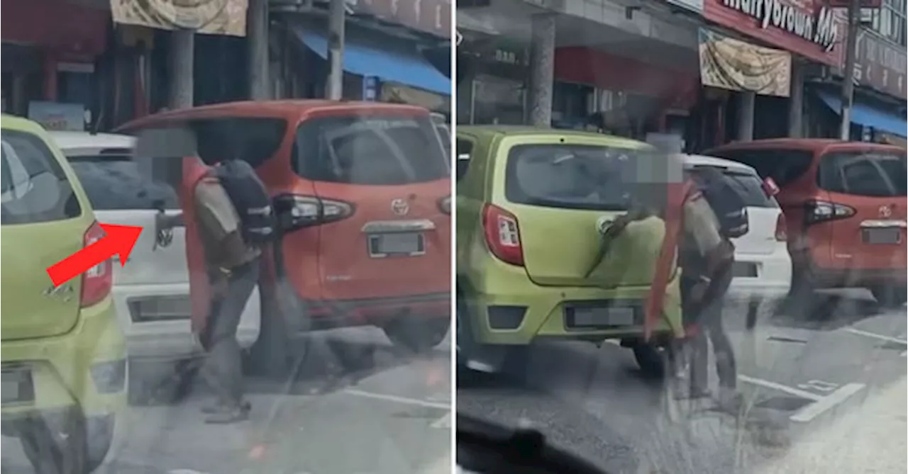 [VIDEO] PDRM Arrests Man For Breaking Rear-Window Wipers Of Cars Parked Near Bus Terminal