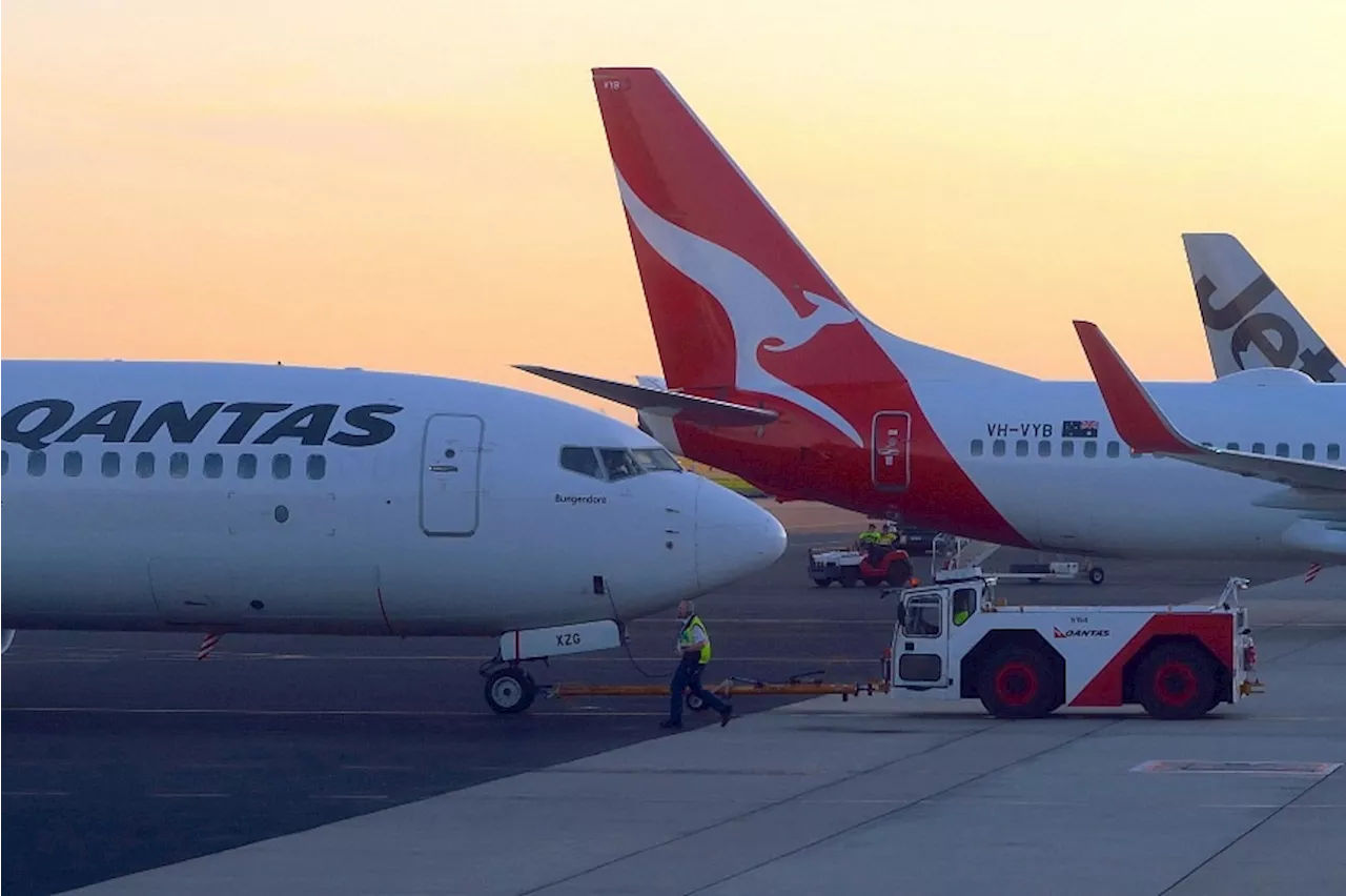 Australia's Qantas told to pay $150,000 to 3 sacked workers in landmark outsourcing case