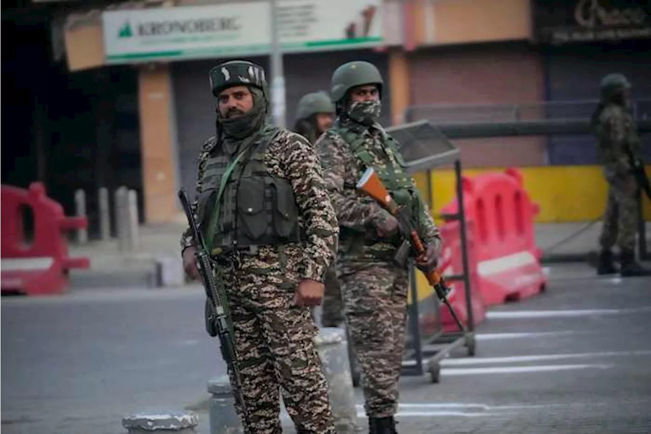 Gunmen kill 7 people working on a strategic tunnel project in Indian-controlled Kashmir