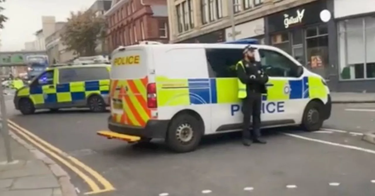 Woman in her 30s dies after being hit by a bus at notorious city centre junction