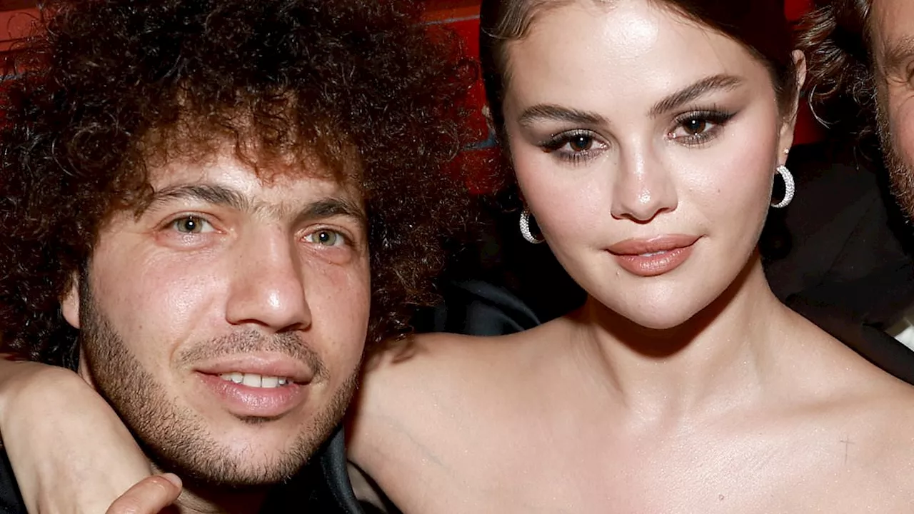 Selena Gomez proves she is still going strong with Benny Blanco as they hold hands at Emilia Perez...