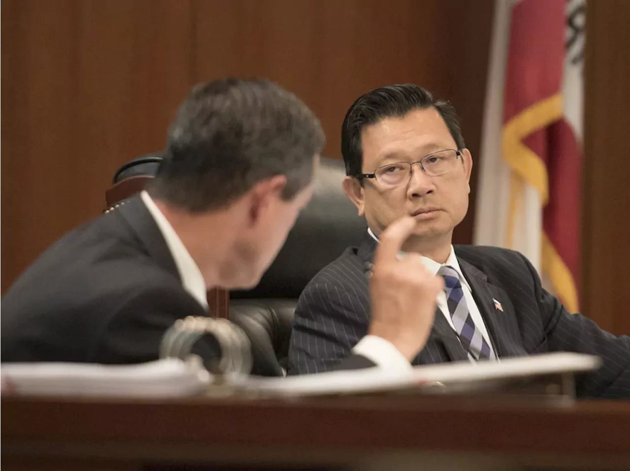 Orange County supervisor accused of taking bribes, pleads guilty to conspiracy, and resigns