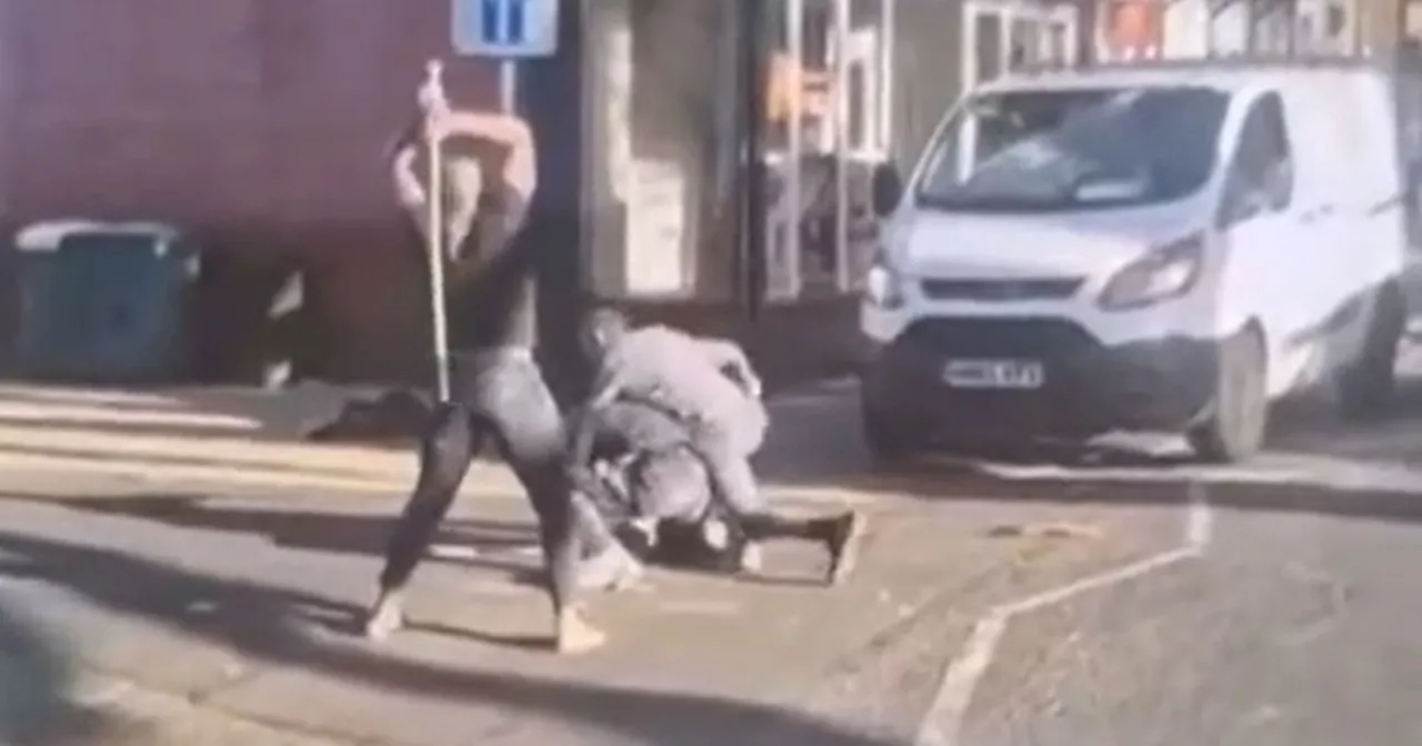 Horrifying video of man being attacked with metal poles in road