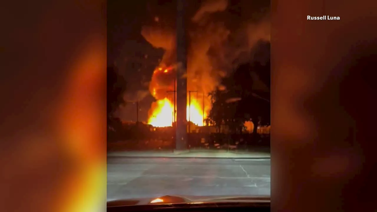 Firefighters battle large pallet fire near Dallas Love Field, power outages reported