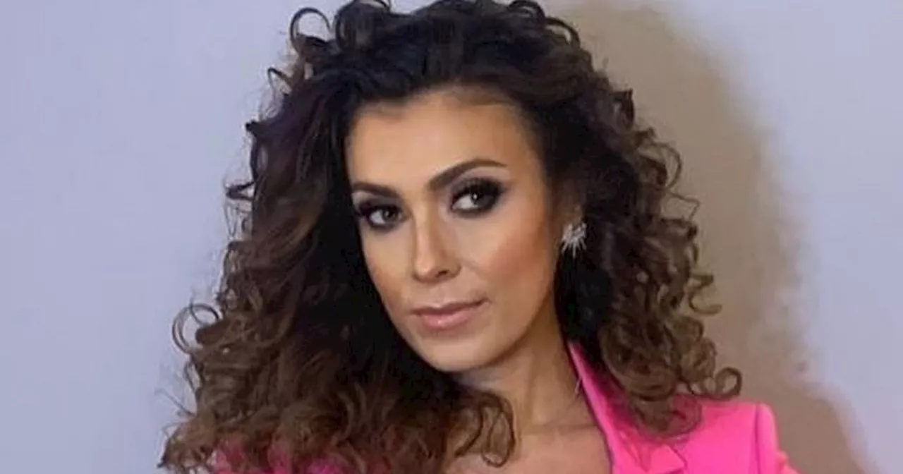 Kym Marsh debuts very voluminous hairstyle as she poses with children