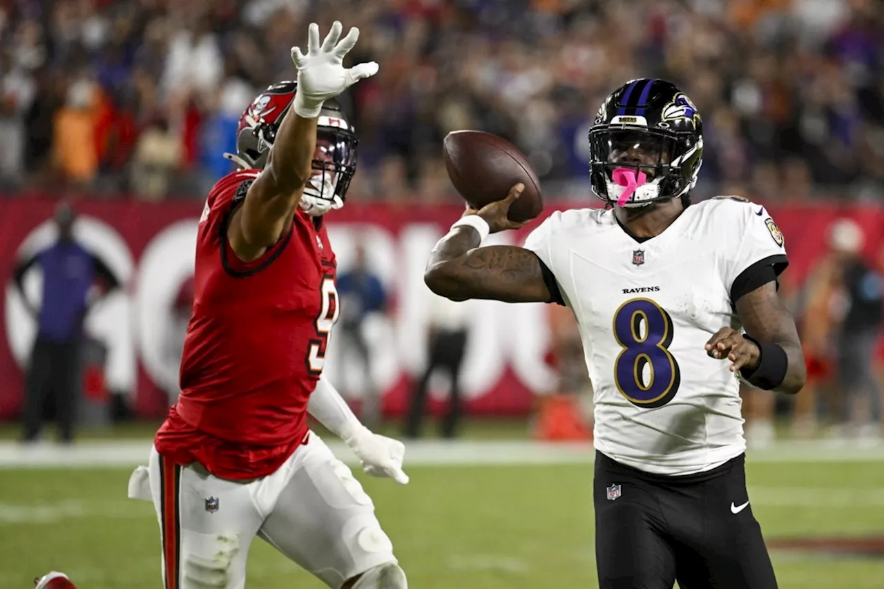 NFL roundup: Ravens win fifth straight game by beating Bucs 41-31