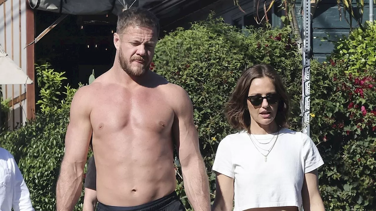 Imagine Dragons' Dan Reynolds enjoys shirtless stroll with girlfriend Minka Kelly in LA