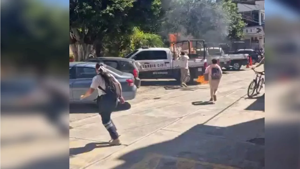 En Michoacán, vinculan a diez personas por agredir a policías e incendiar una patrulla