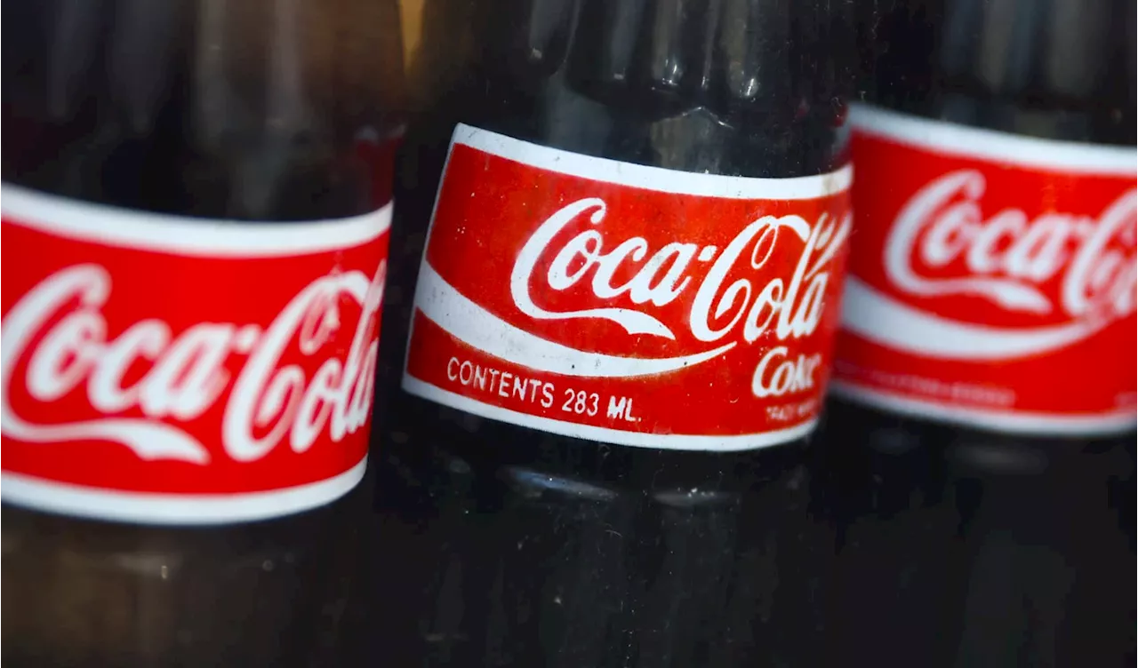 Coca-Cola tops earnings estimates, as higher prices offset sluggish demand