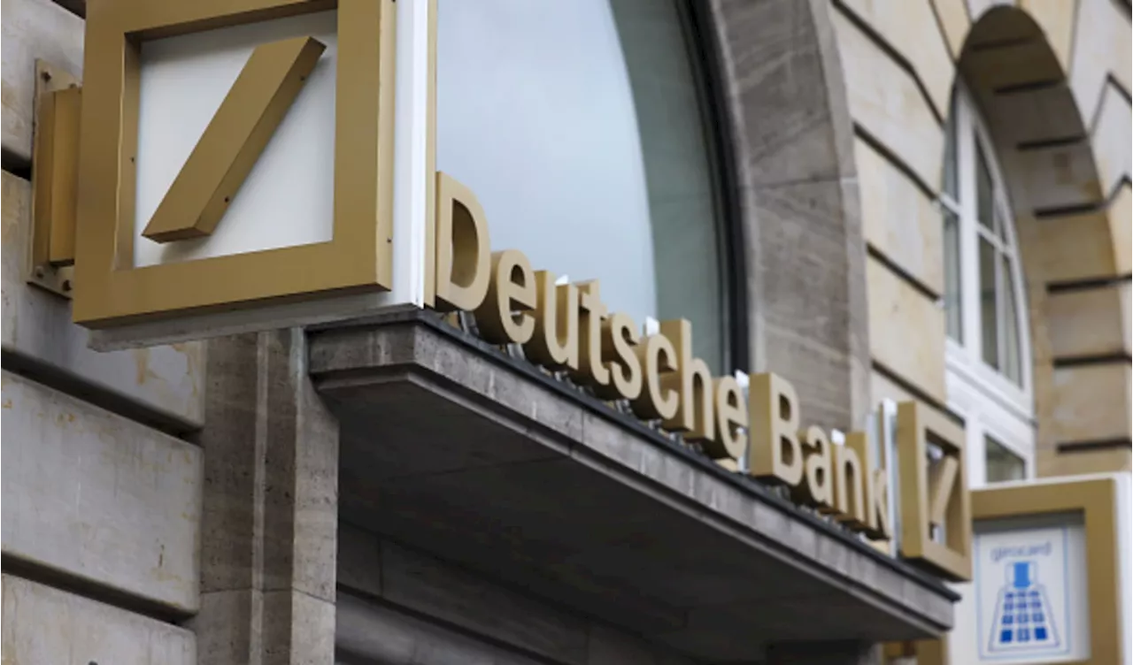 Deutsche Bank swings back to profit in the third quarter, beating expectations