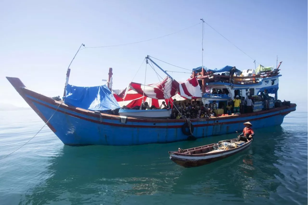 About 140 Rohingya Muslims on wooden boat off Indonesia's coast as residents refuse to let them land