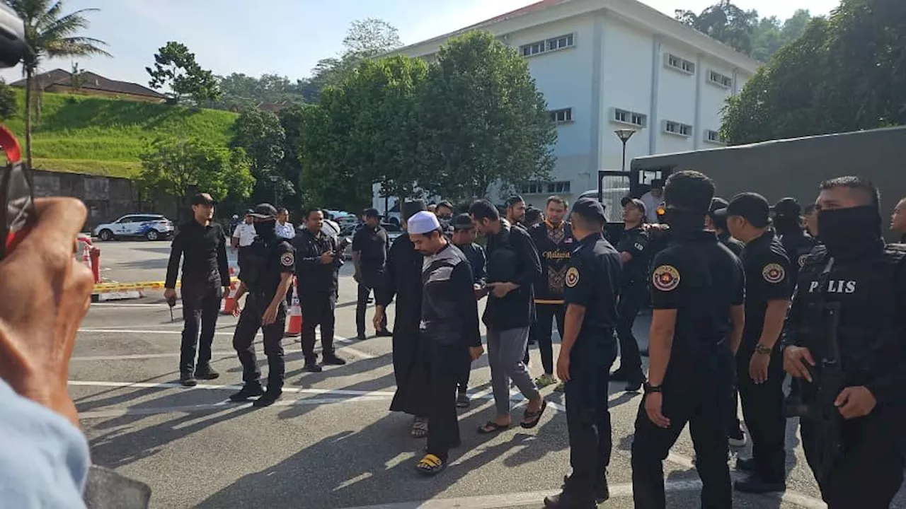 GISB accused arrive at Selayang court complex ahead of charging