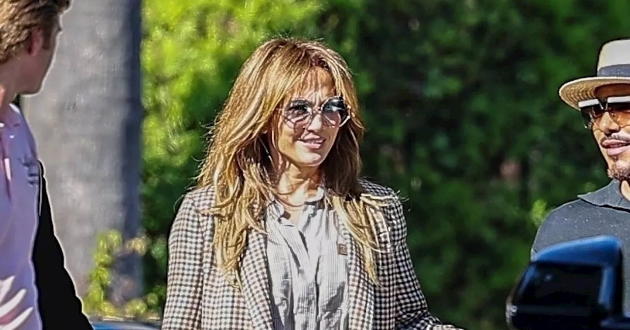 Jennifer Lopez Pairs ’70s Fringe Bangs With Baggy Boho Denim