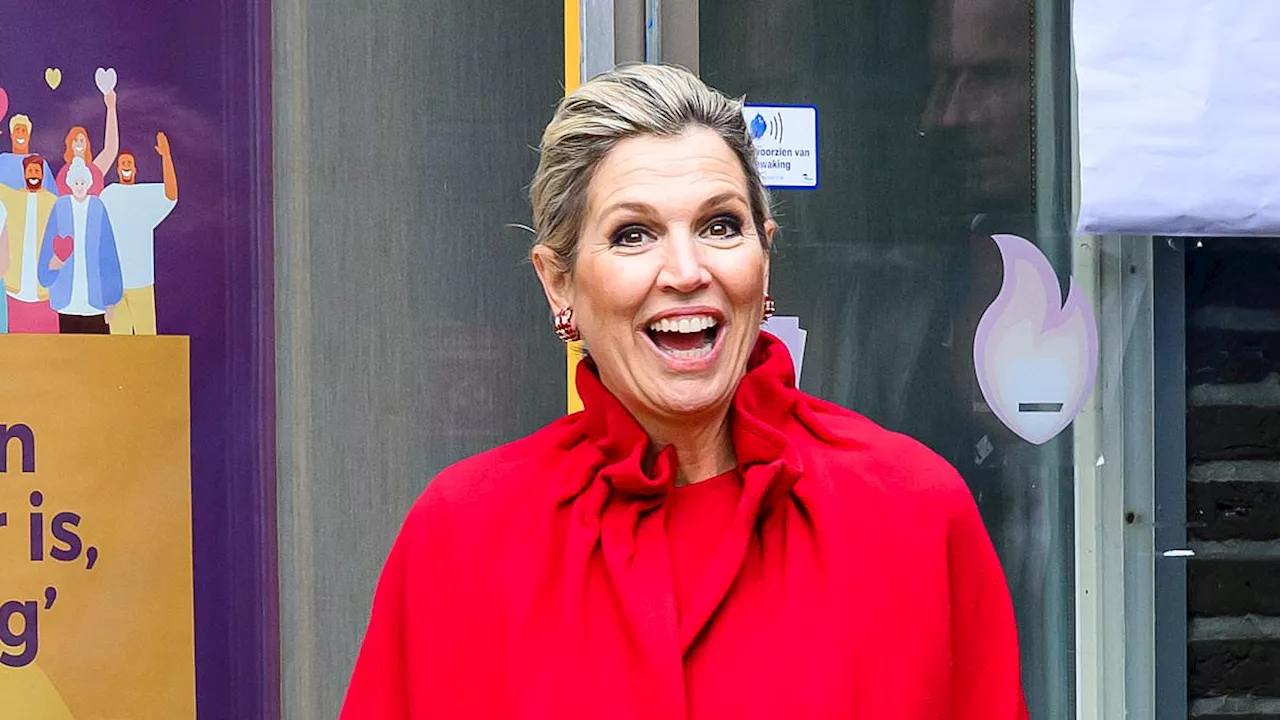 Queen Máxima of the Netherlands wows in a matching scarlet coat and dress as she packs her day with...