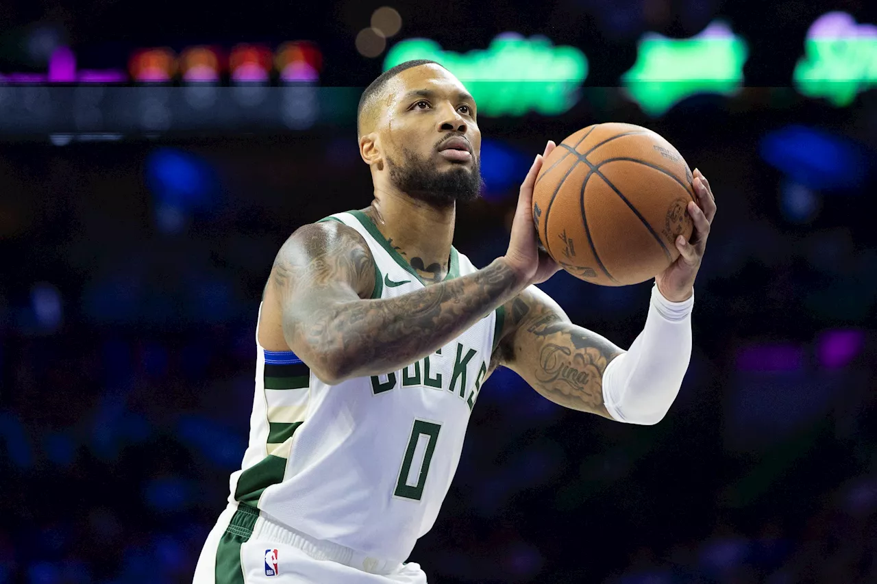 NBA: Damian Lillard, Bucks pull away for opening win over 76ers