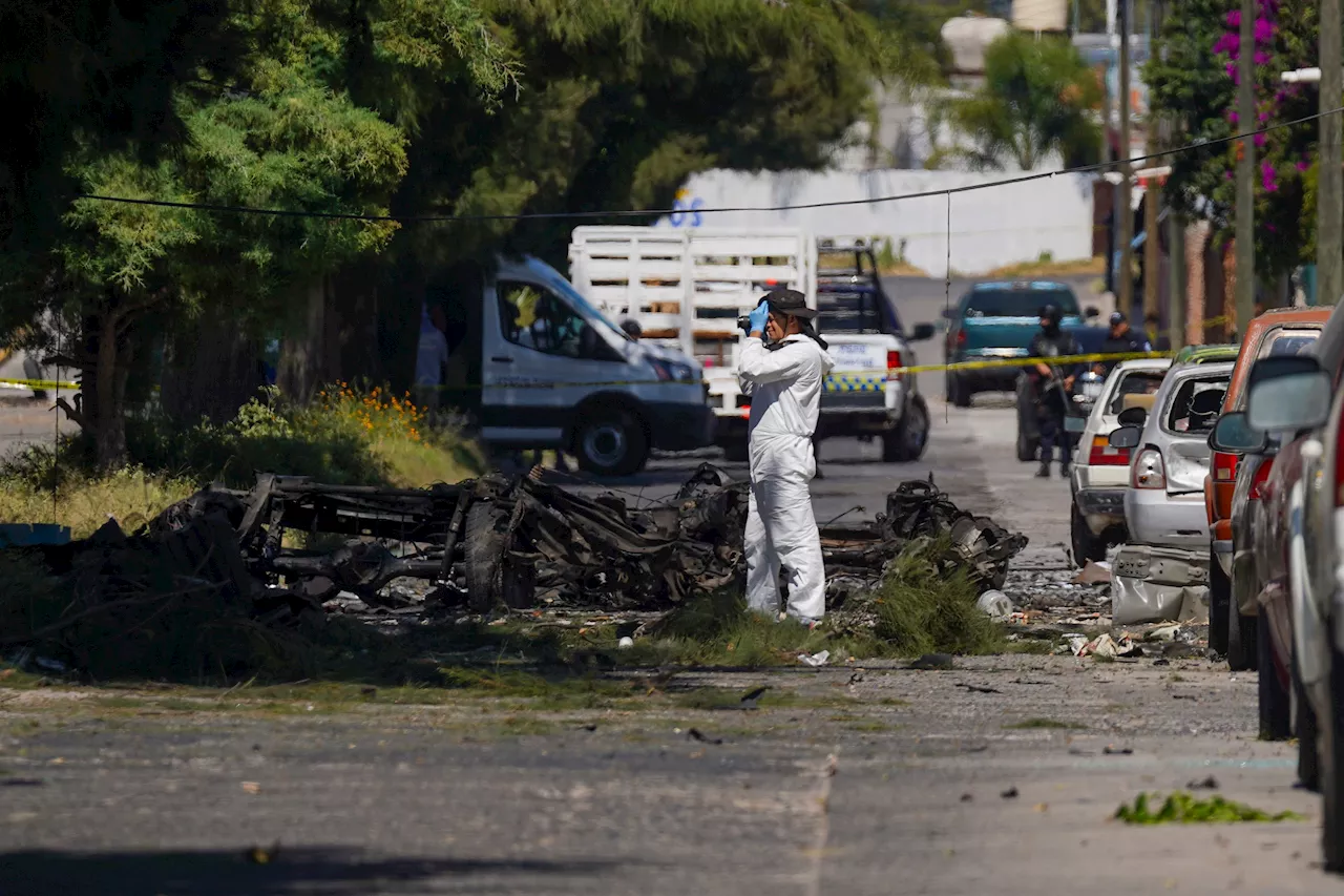 A car bomb explodes outside a police station in western Mexico, wounding 3 officers