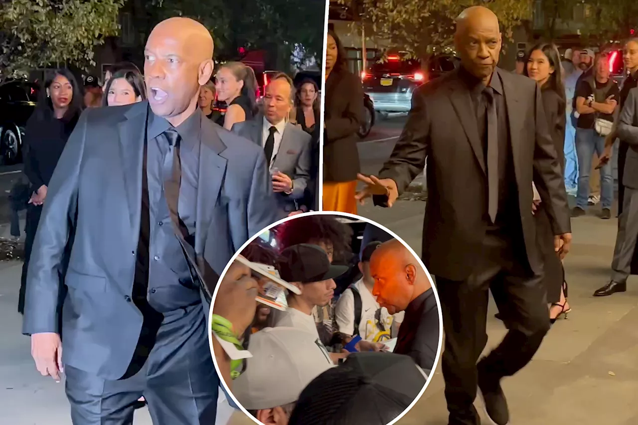 Denzel Washington appears to get into heated exchange with autograph seekers outside NYC event