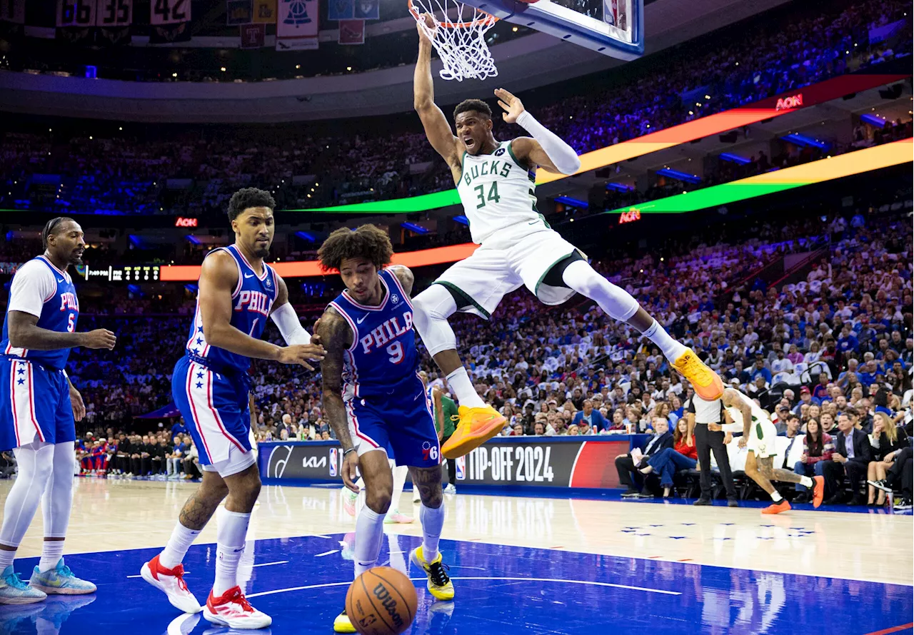 Giannis, Lillard-led Bucks pull away for opening win over 76ers already missing Embiid, George