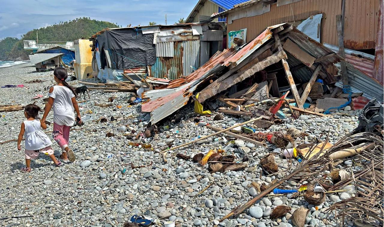 IN PHOTOS: Kristine destroys houses, beach cottages in Surigao City