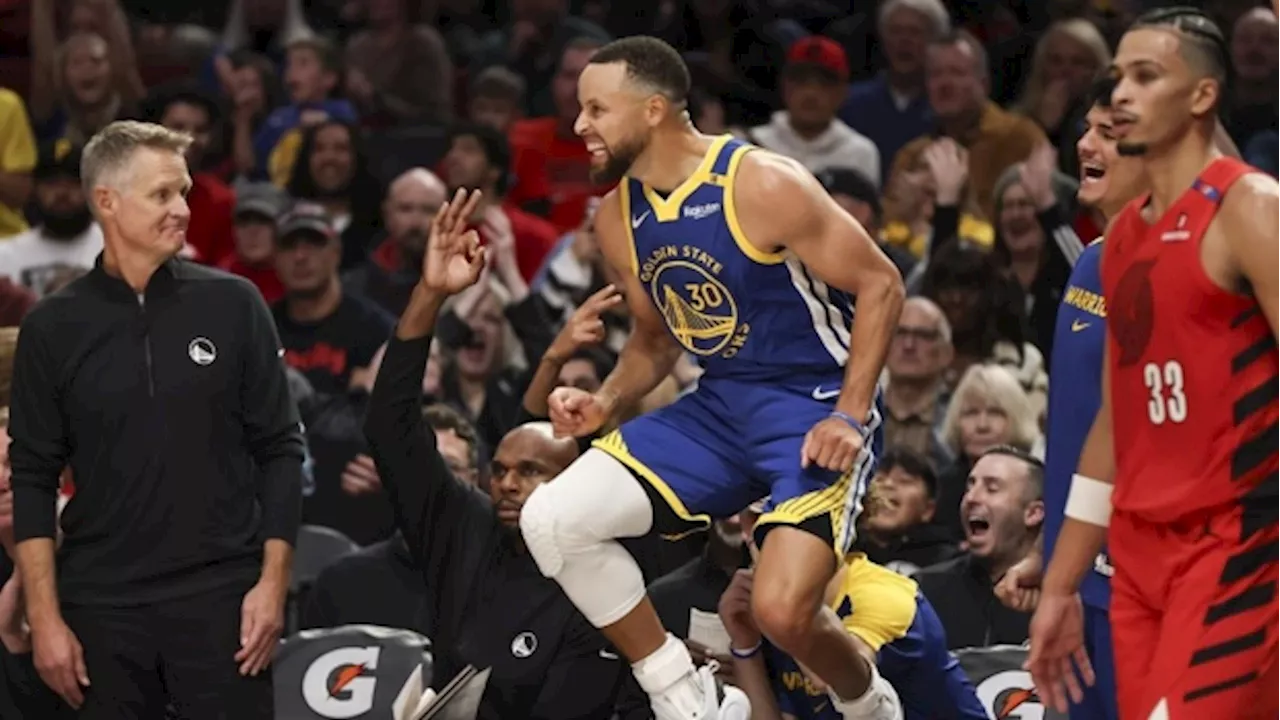 Curry leads Warriors in season-opening rout of Trail Blazers