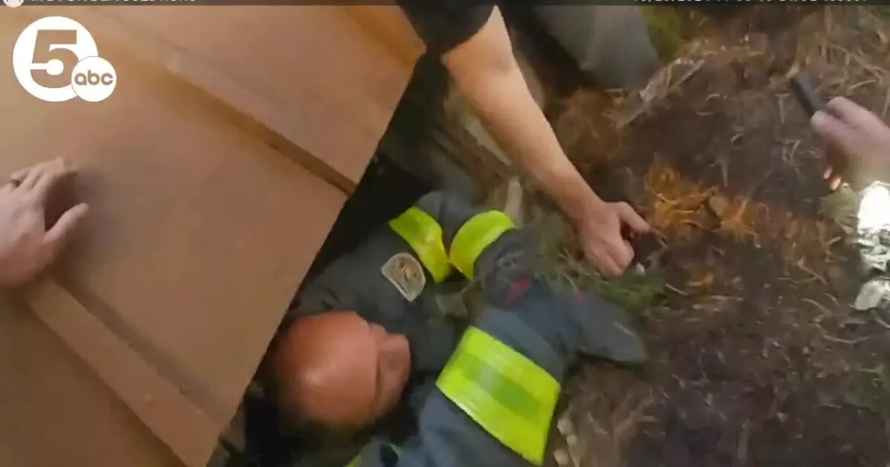 VIDEO: Firefighters, Medina sheriff's deputies rescue woman trapped in basement of burning home