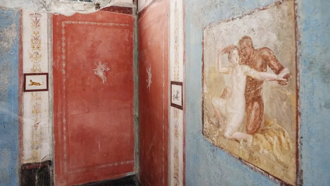 Tiny house with elaborate – and erotic – frescoes unearthed at Pompeii