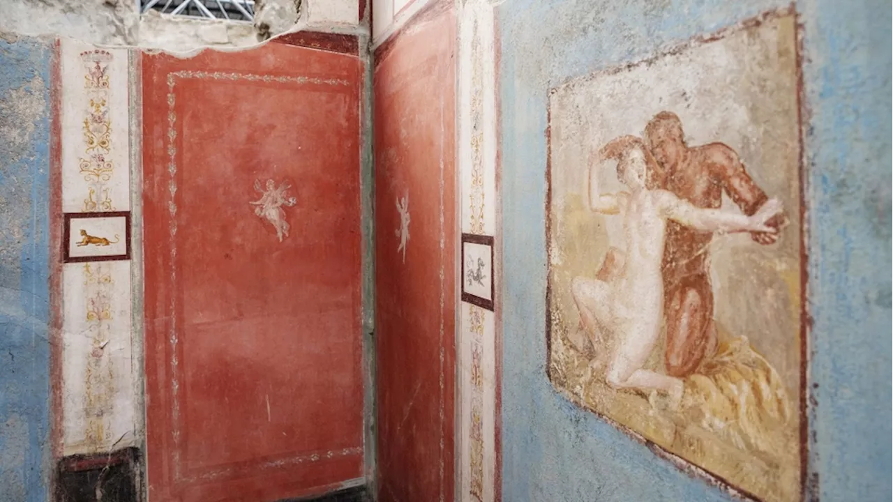 Tiny house with elaborate – and erotic – frescoes unearthed at Pompeii