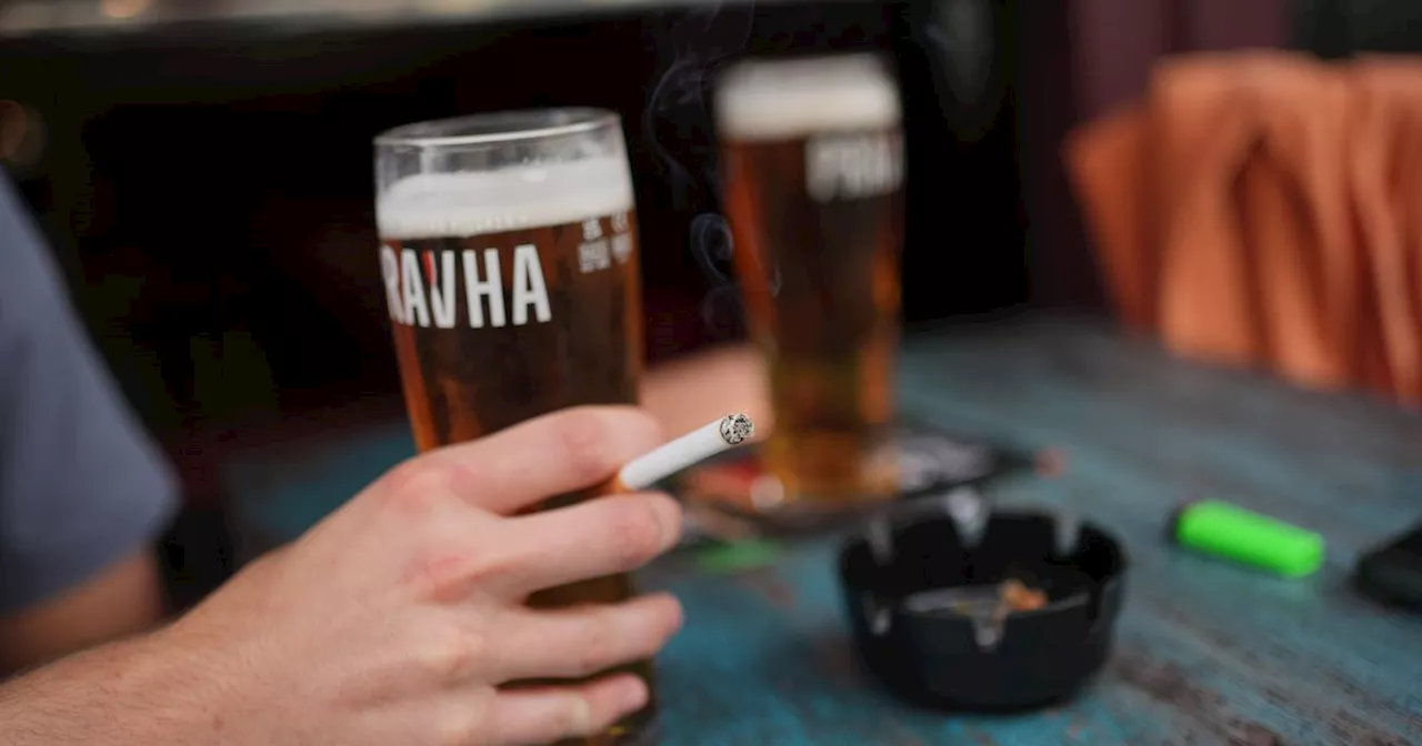 Plans to ban smoking outside pubs 'to be dropped' after backlash