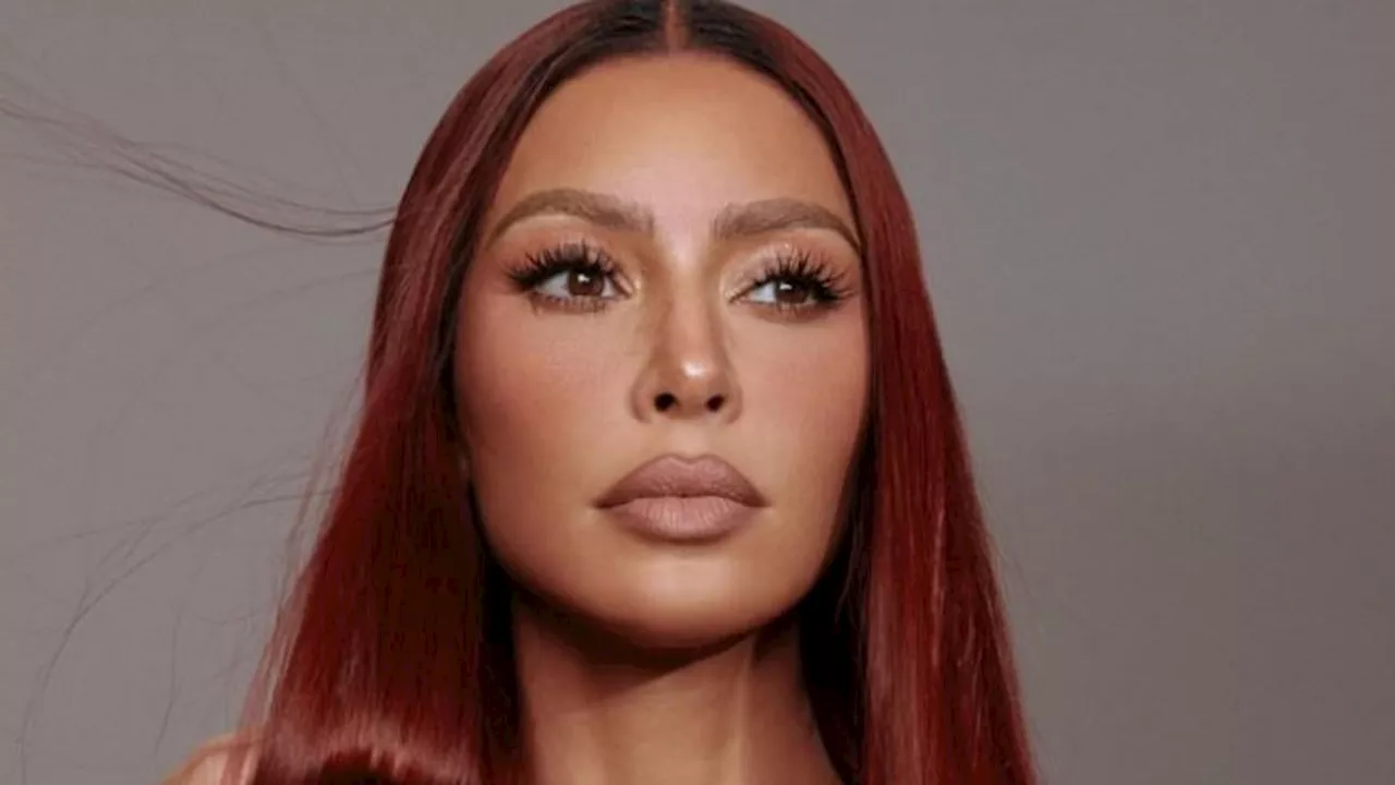 Kim Kardashian, 44, is nearly unrecognizable with red hair and micro-freckles for announcement