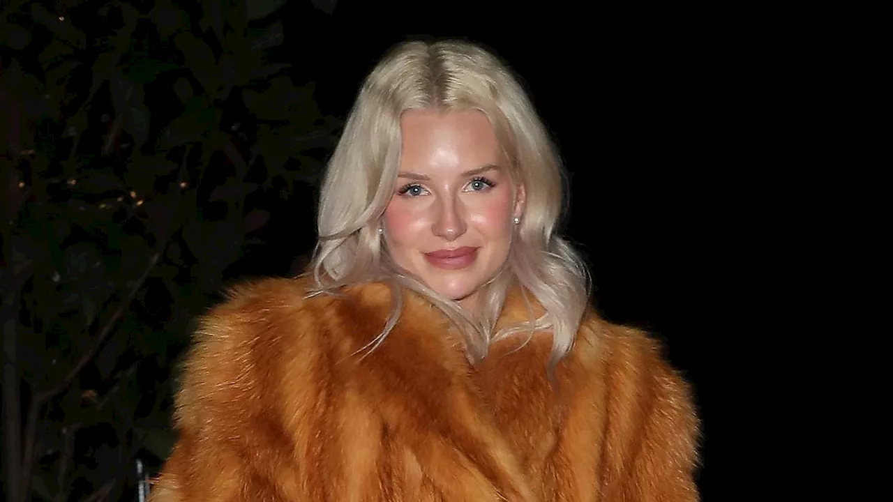 Lottie Moss layers her mini dress under a cosy brown faux fur coat as she enjoys a night out at...