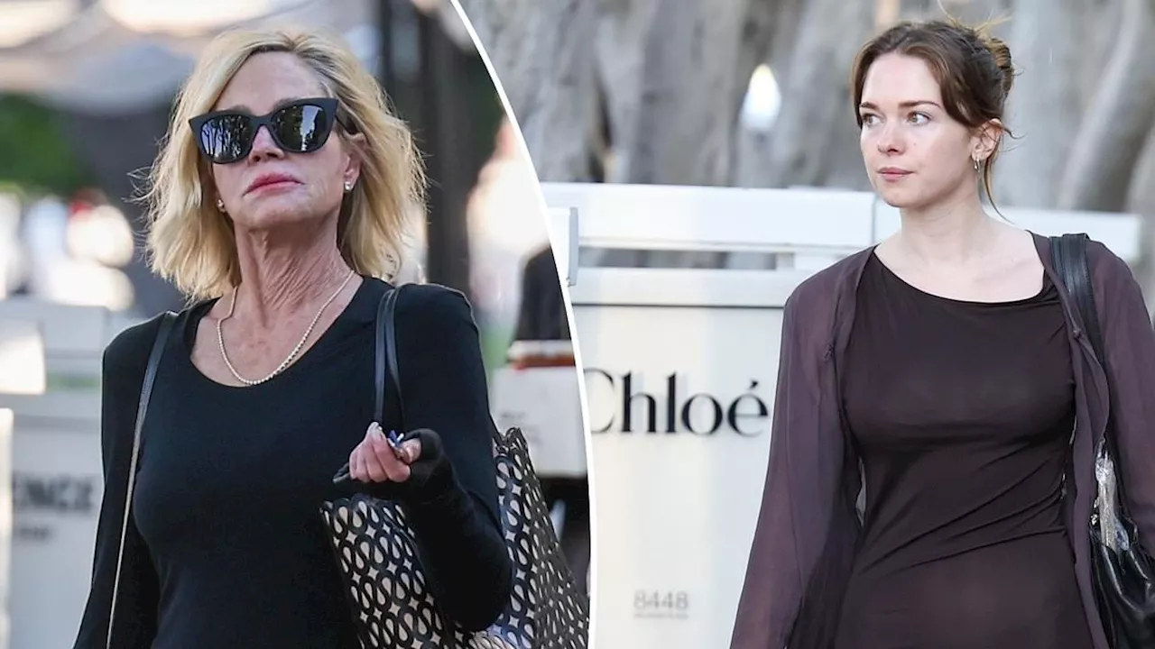 Melanie Griffith, 67, holds onto a cigarette as she takes mini-me daughter Stella Banderas, 27, to...