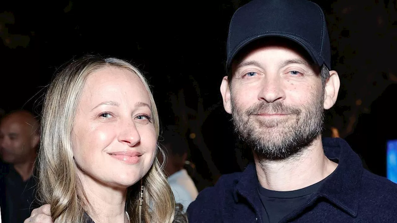 Tobey Maguire poses with ex Jennifer Meyer after Gwyneth Paltrow 'helped keep them close'