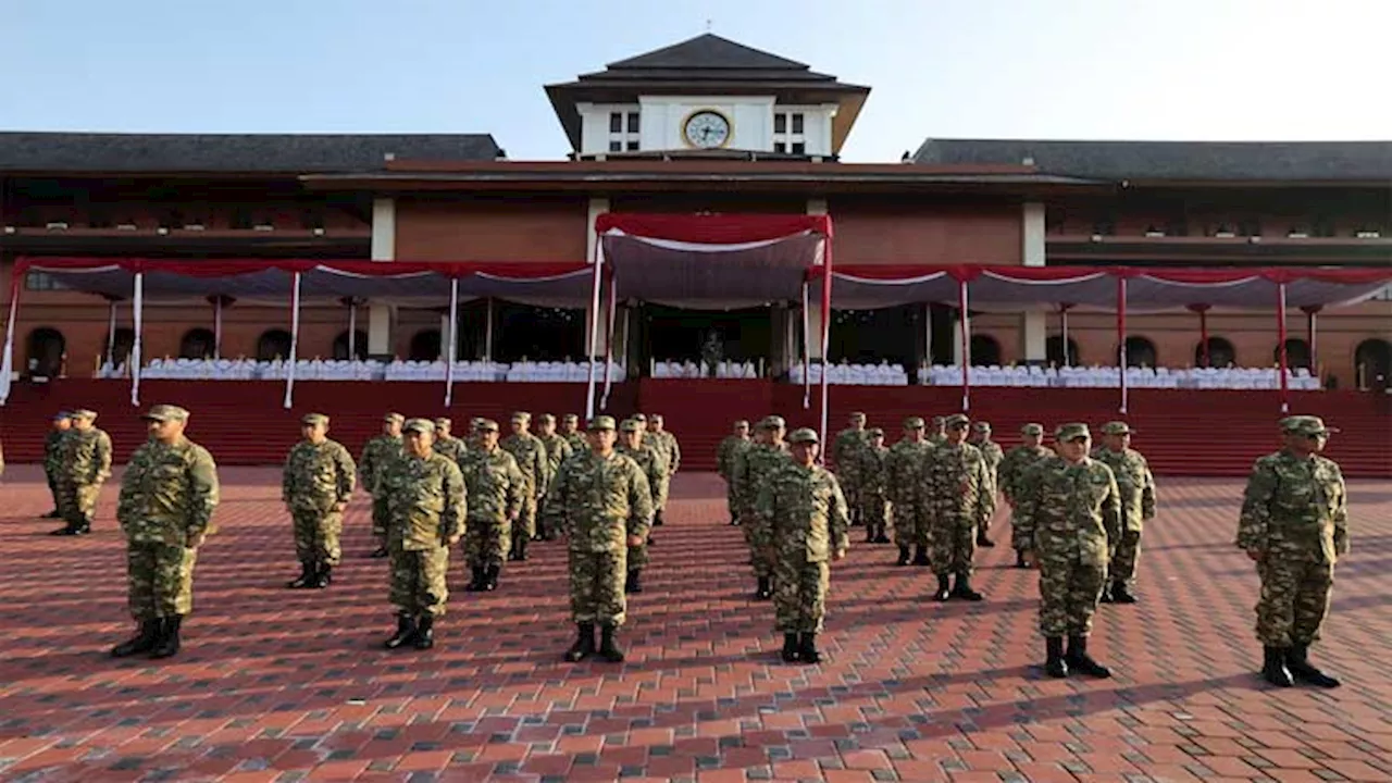 With green camo and combat boots, Indonesia's new cabinet kicks off army retreat