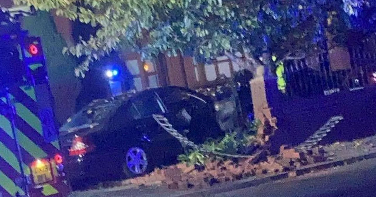 Car ploughs into garden wall before 'driver with Tesco bags walks off'