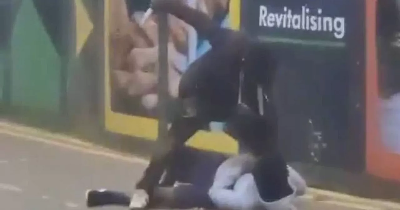 Horrific moment knifeman towered over man before stabbing him