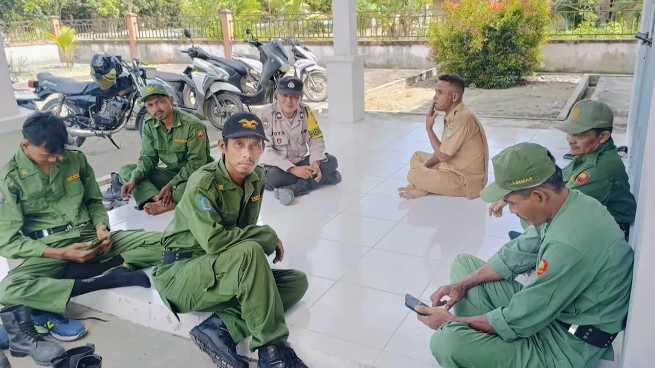 Polisi dan Linmas Rokan Hulu Perkuat Sinergitas Pengamanan Tahapan Pilkada di Desa