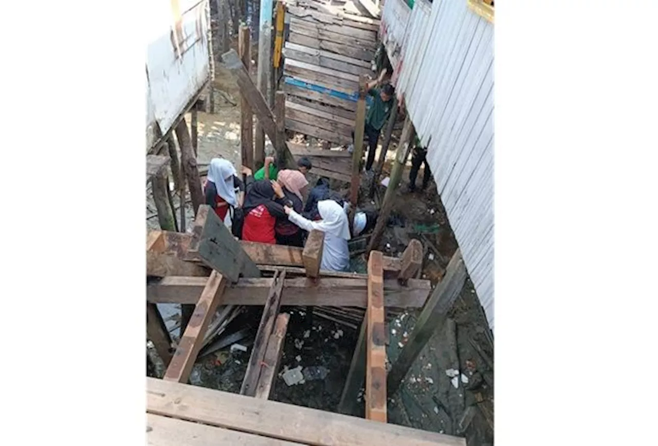 Teachers, students hurt after bridge collapses near water village near KK