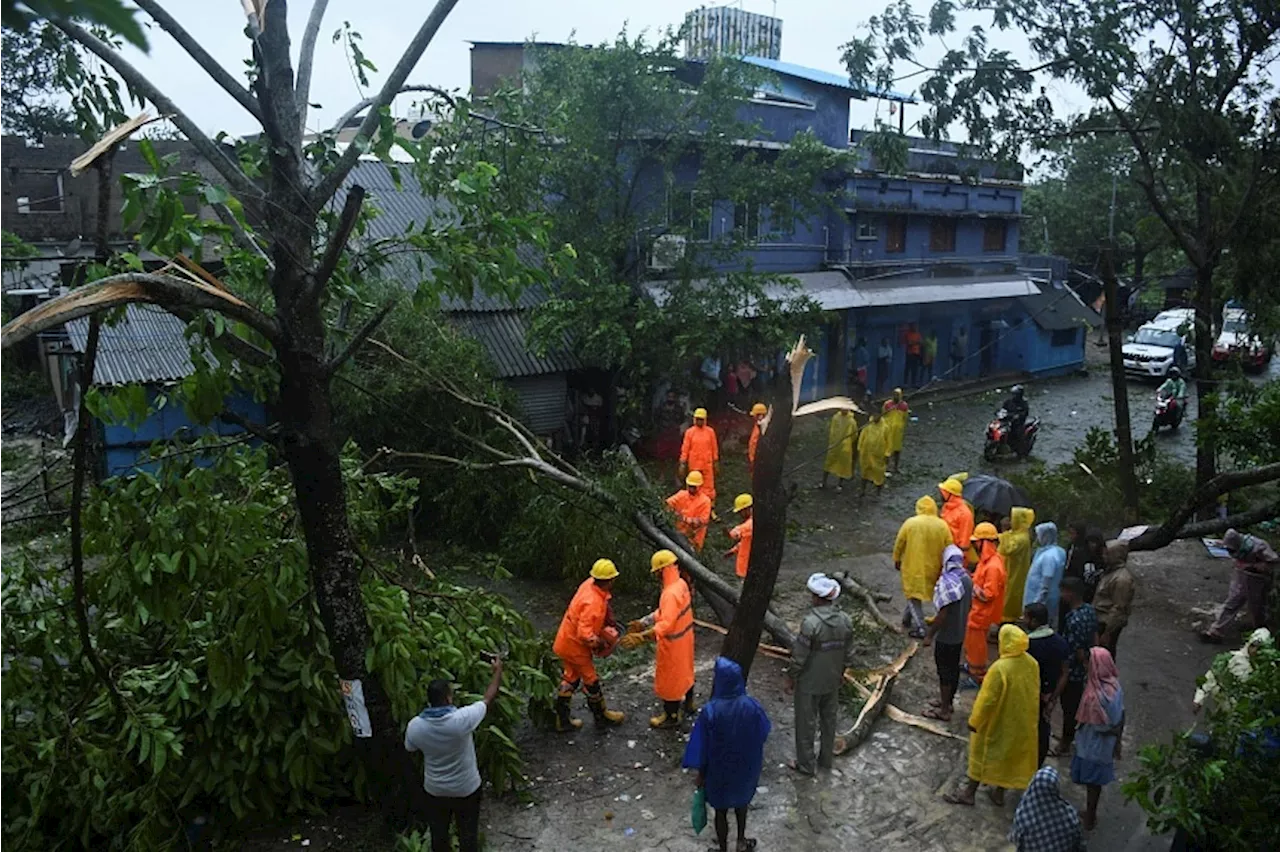 Trees uprooted, power lines snapped as Cyclone Dana pummels India's east coast