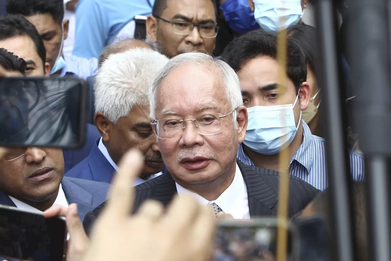 Jailed ex-Malaysian PM apologizes for fund misuse scandal