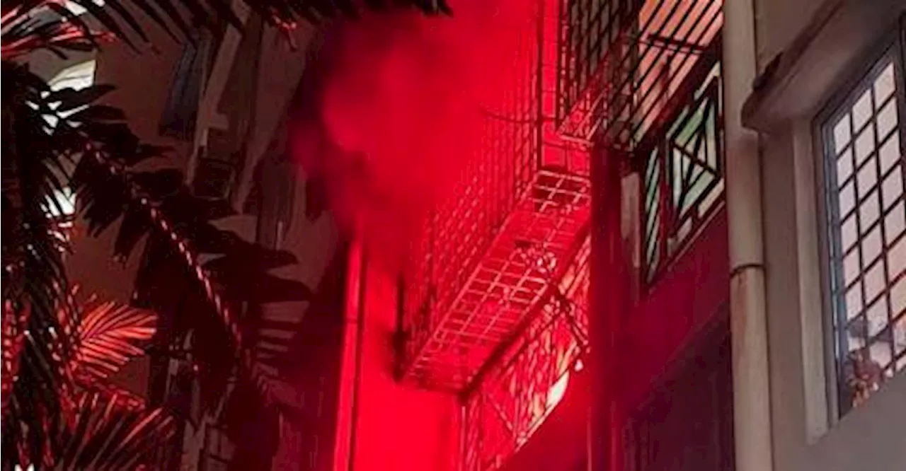 Firemen rescue three trapped in apartment blaze