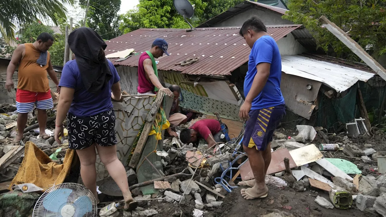 At least 115 dead and missing in massive flooding and landslides in Philippines