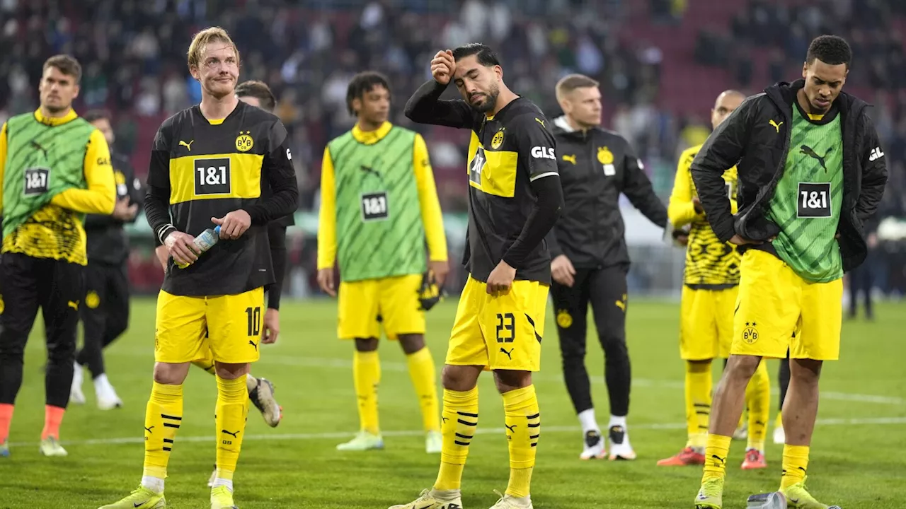 Dortmund slumps to another loss at Augsburg as Leipzig tops the Bundesliga