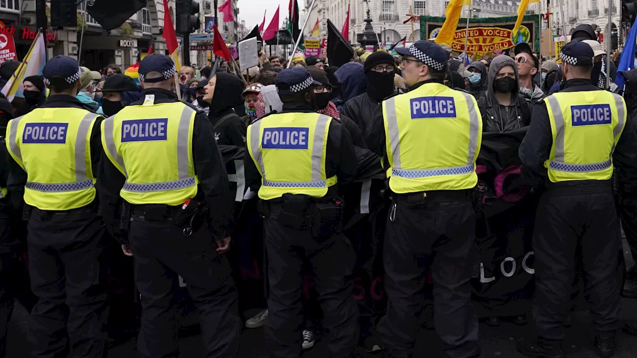 Supporters of far-right British figure rally as anti-racism demonstrators mount counter-protest