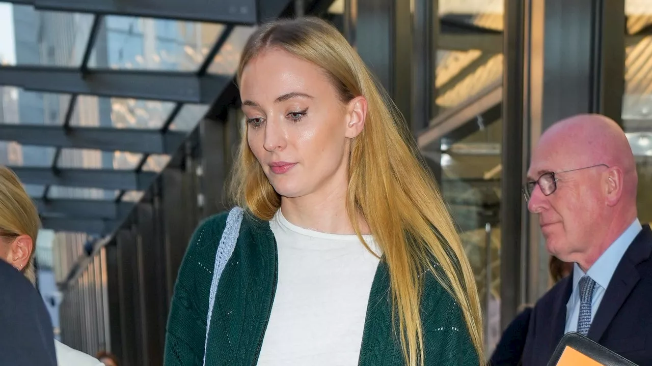 Sophie Turner Elevates Basic Sweatpants and Taylor Swift Merch With the Sandwich Technique