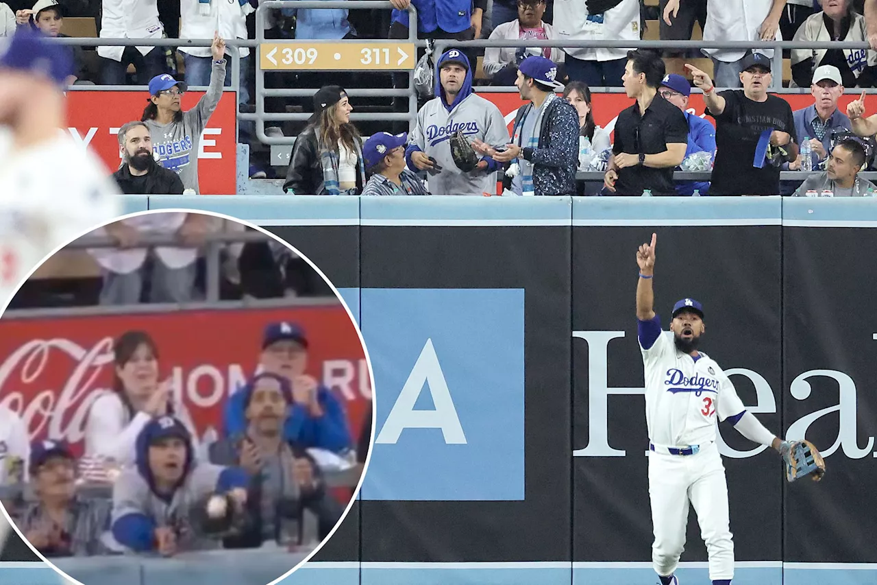 Dodgers fan interferes with Yankees' near-homer in World Series Game 1 controversy